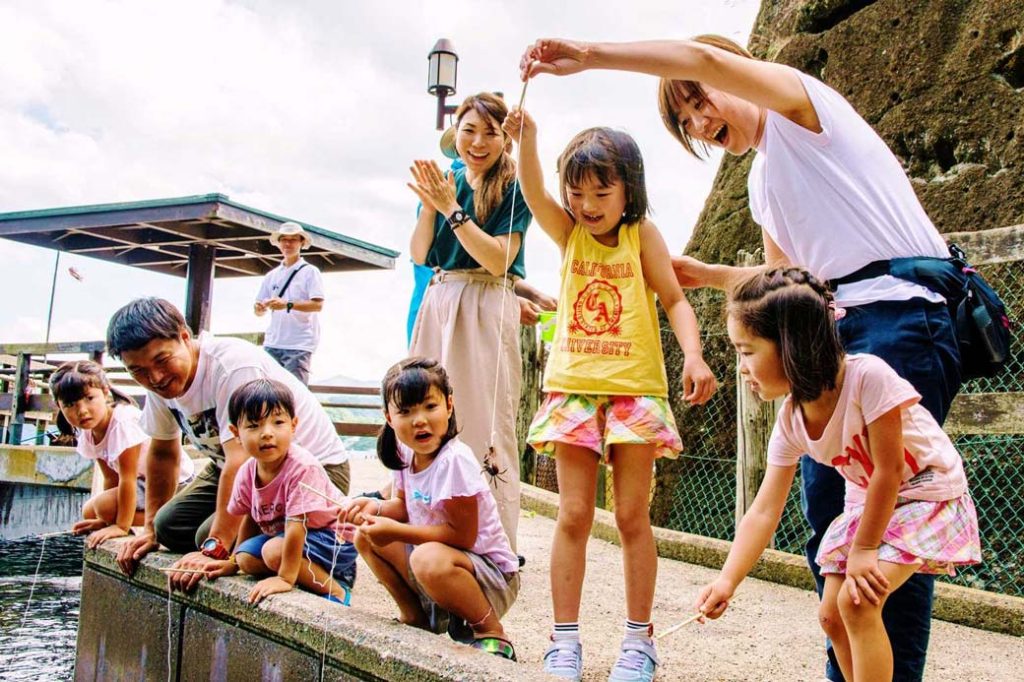Crab fishing on the beach of Kamome Island